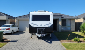 so what is the alt text10:27 AMcaravan parked in driveway of Australian home council rules over 55s