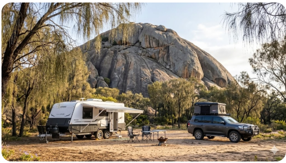 Caravan parked at Baladjie Rock free campsite among sheoaks, Wheatbelt Western Australia
