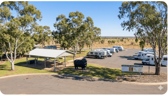 Blackall Rest Area showing shaded parking area with heritage Ram statue and information shelter for grey nomad travellers in outback Queensland
